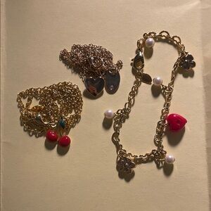 Gold and Red Charm Bracelet and Necklace Bune